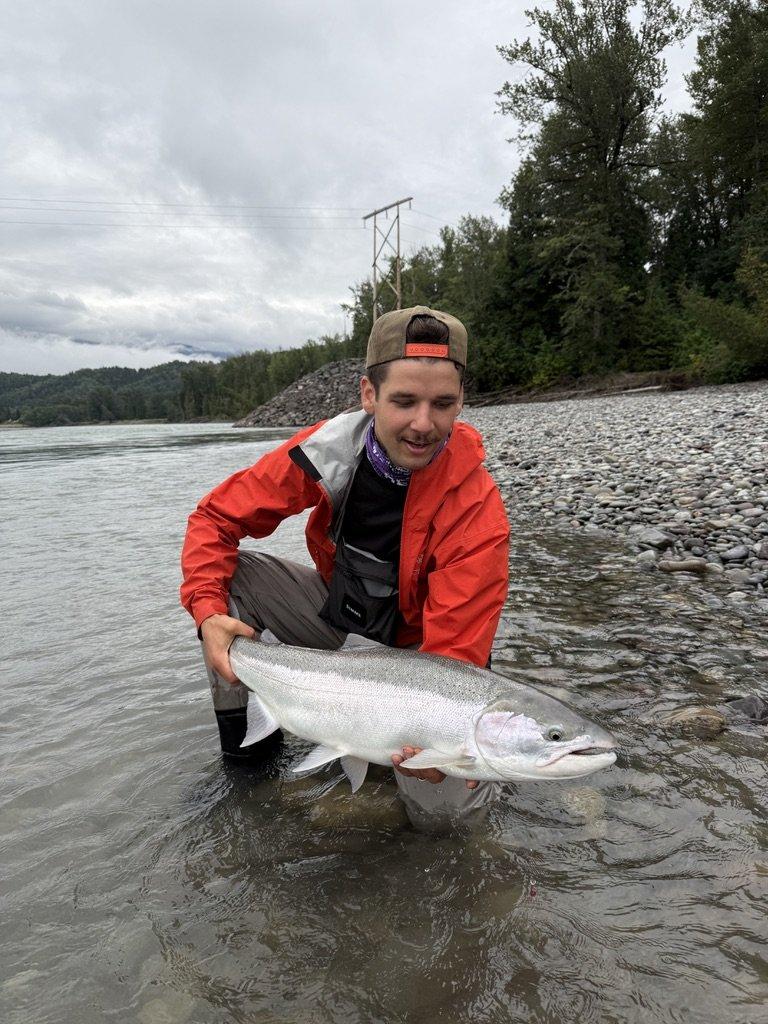 Holding a steelhead on the Skeena River