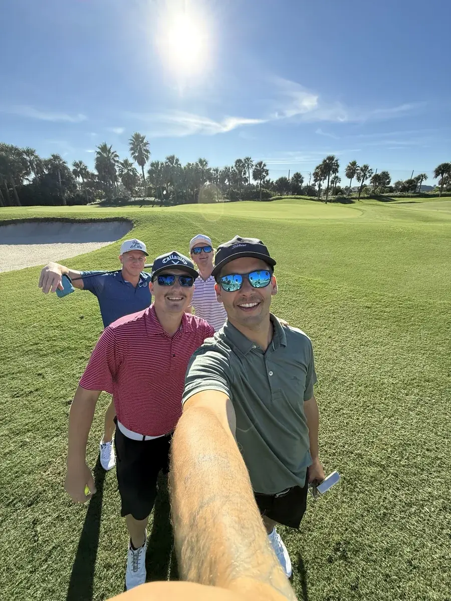 Kaden Ewald with fellow participants on the course at The GATE Foundation charity golf event.